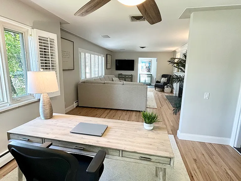 Dedicated workspace opening up to living room