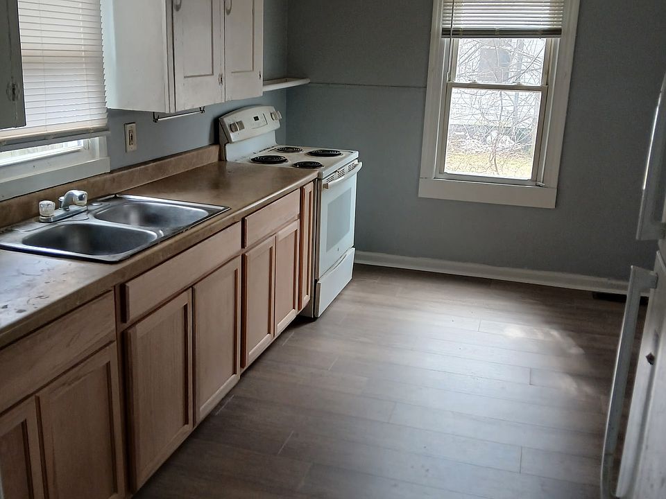 New flooring & freshly painted throughout. Appliances include stove and refrig.