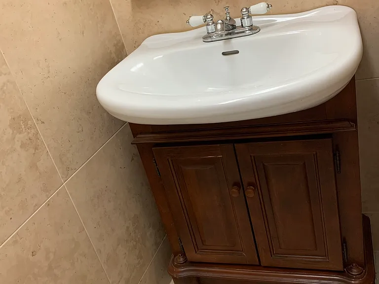 Convenient half-bathroom on the first floor.