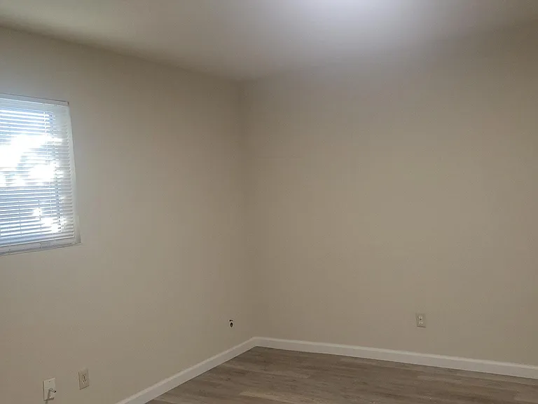 Bedroom corner with window