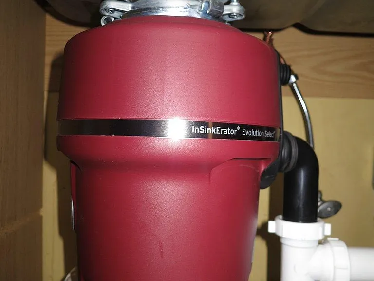 New heavy duty garbage disposal under the kitchen sink.