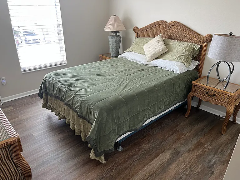 Bedroom 2 also has a queen sized bed, TV and plenty of closet space. New flooring.