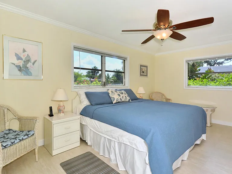 Large master bedroom with king bed and 48'' TV