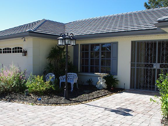 covered entrance w/iron gate