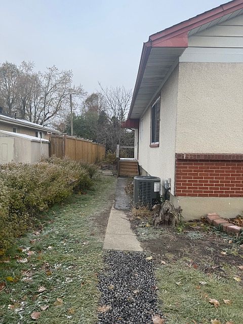 Side door entrance to basement apartment