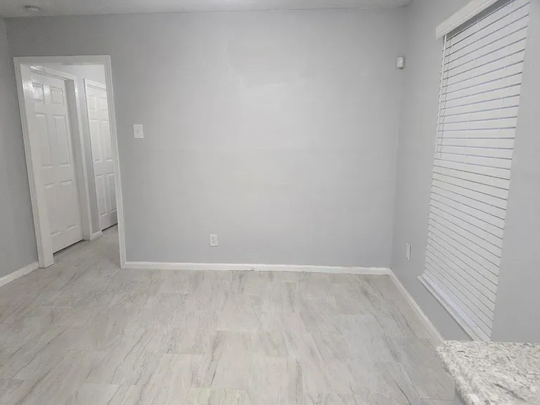 7702 Claiborne St — Photo 4