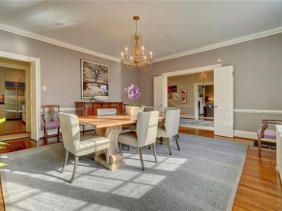 View to foyer and to kitchen area from dining room...fabulous entertaining flow