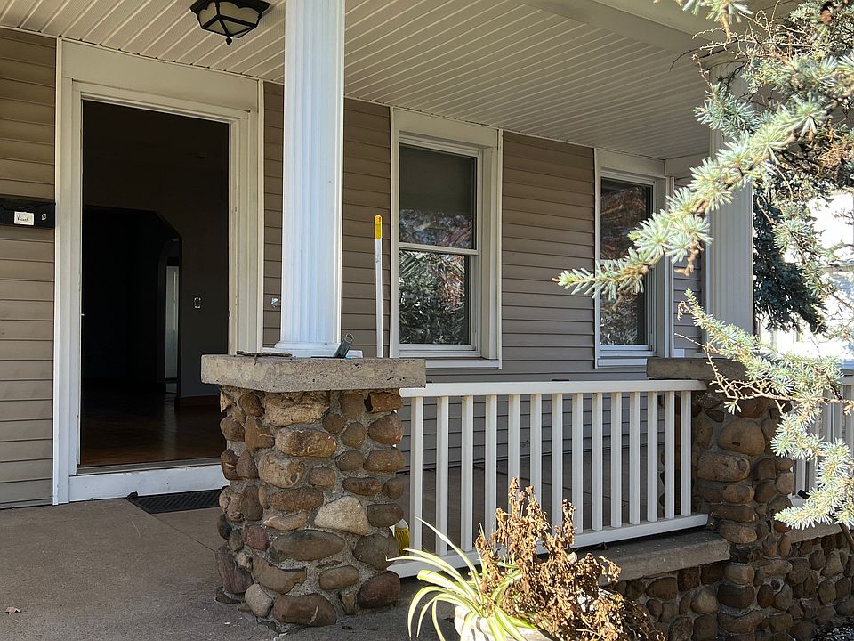 Cute front entrance with privacy and room on porch to enjoy morning coffee with a nice front patio set up