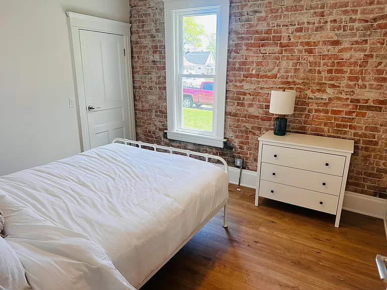 Main floor bedroom with queen bed.