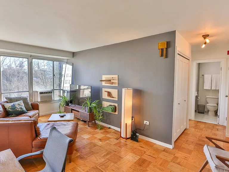 Open, bright, and cozy living area, including 55" TV.