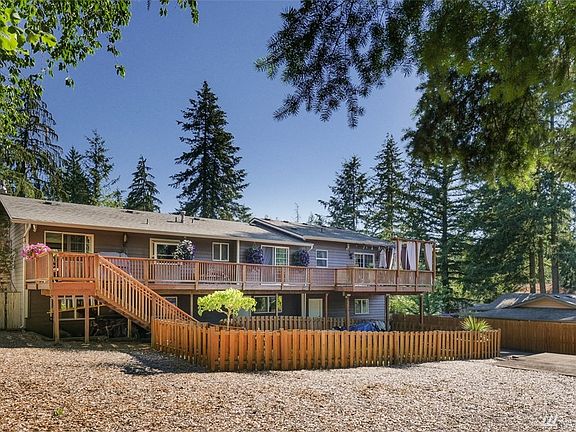 Access stairs from deck to the fully fenced back yard. Over 1/4 acre will provide you with plenty of room. 