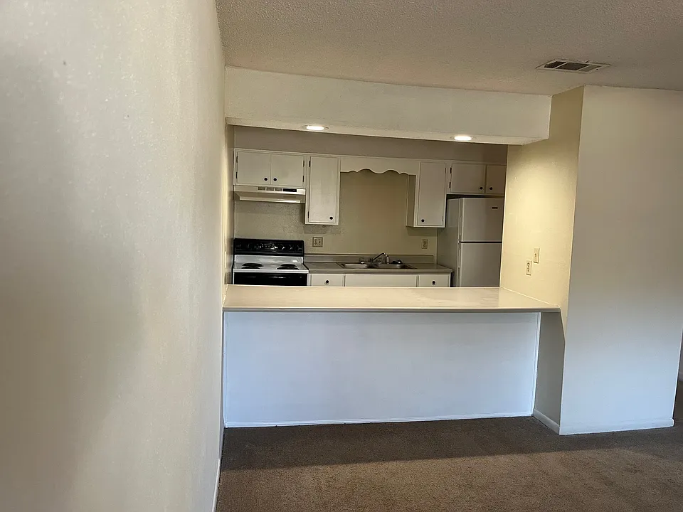 Beautiful upgraded kitchen- newly painted counter top and cabinets