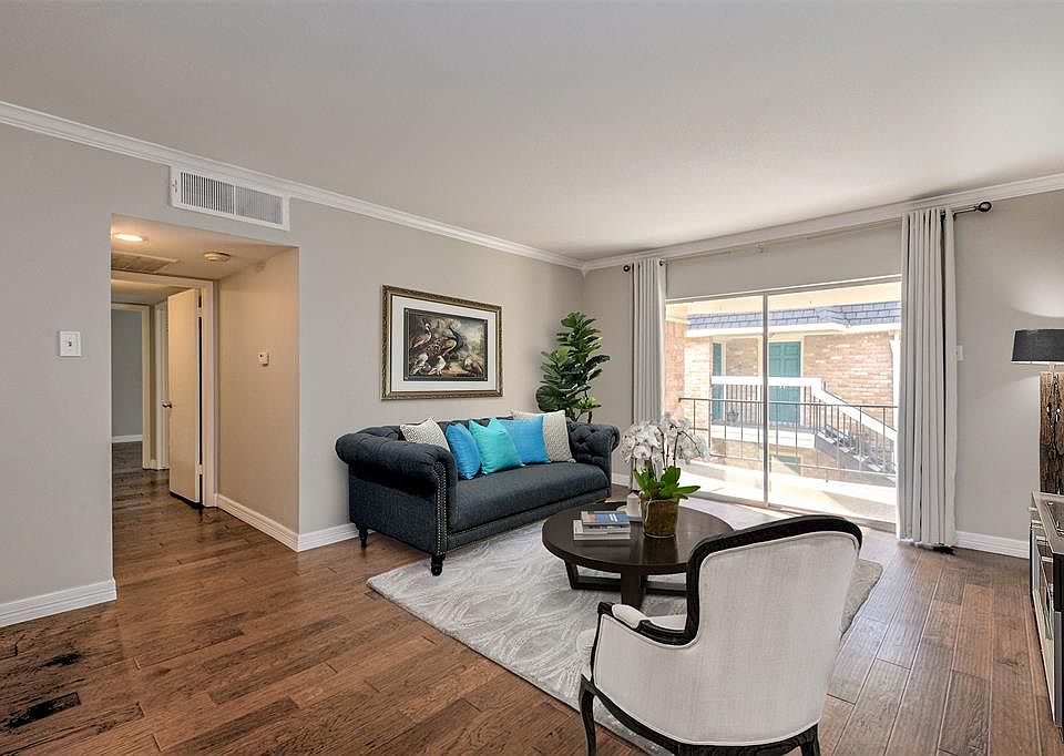 As you enter, you will notice the hardwood floors and new paint.
