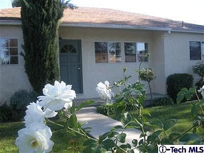 1st image of 6056 Woodman Ave