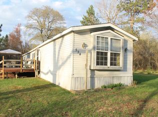 11724 SW Four Point Dr, Fife Lake, MI 49633