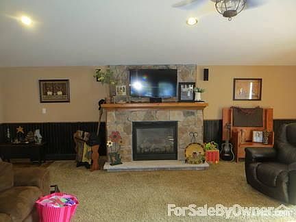 Great Room
						:
						Room is 22'x26' with built in propane stone fireplace/entertainment center