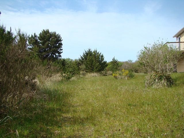 1st image of 303 Sand Dune Ave NW