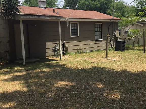 Rear Covered Porch and Laundry Shed