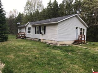 8830 Garbow Rd, Howard City, MI 49329