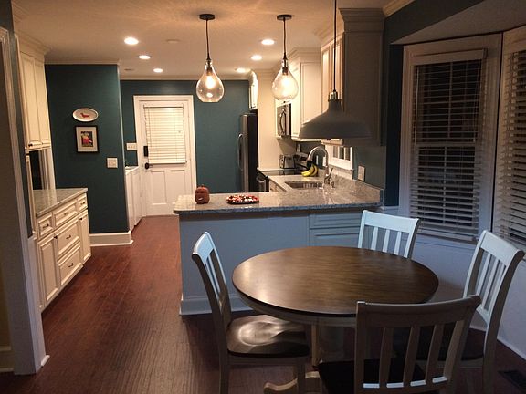 Pull out pantry, trash/recycling and drawers in addition to upper shelving