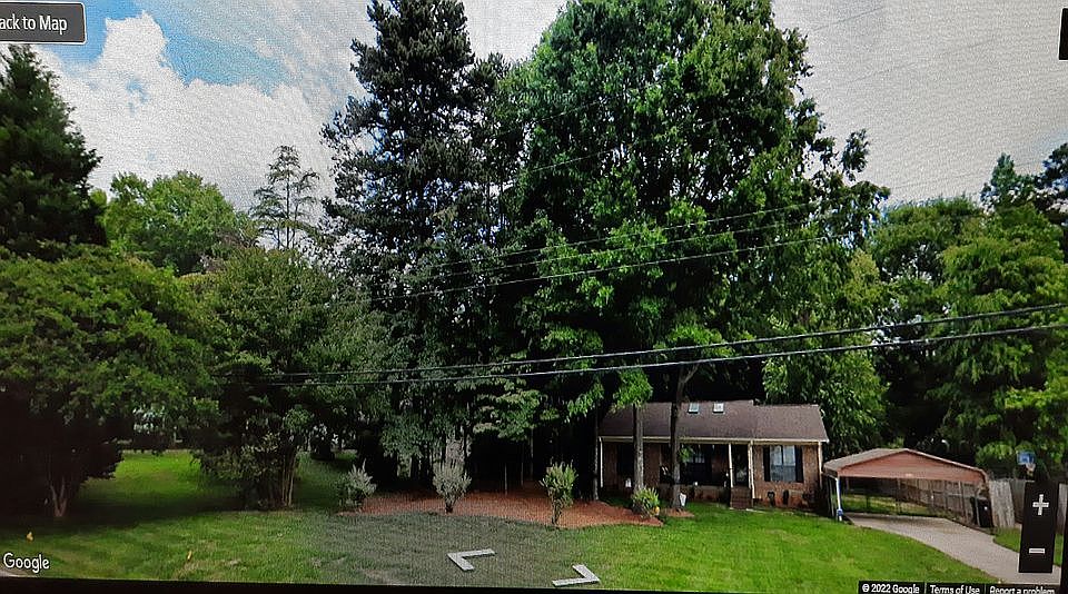 Front of house on large lot