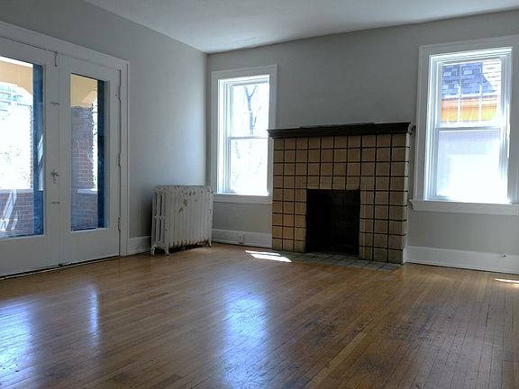 French doors to the covered balcony, and lots of big windows that let in natural light!