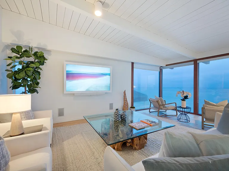 Cosy soft lights create a calm setting with a crackling fireplace in the background.