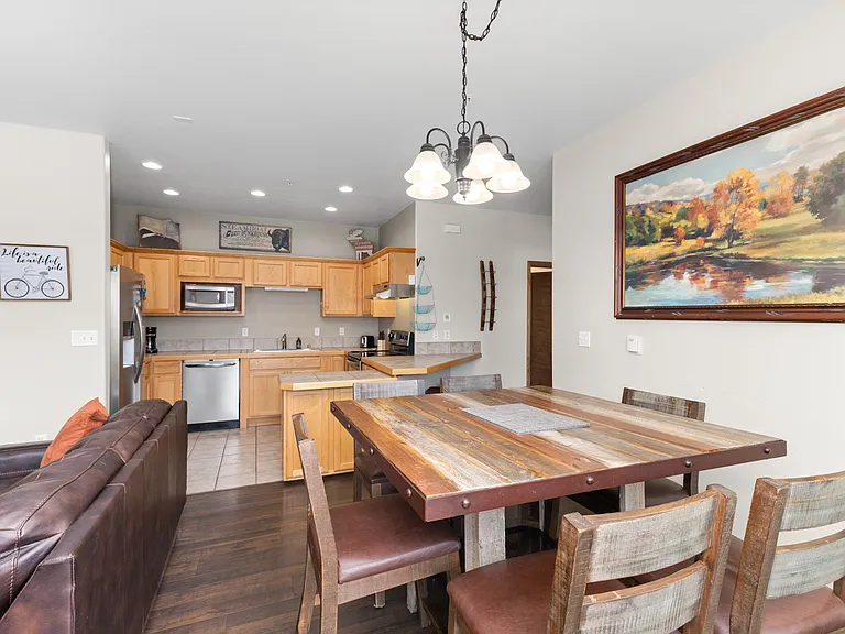 Dining Area with Kitchen in background