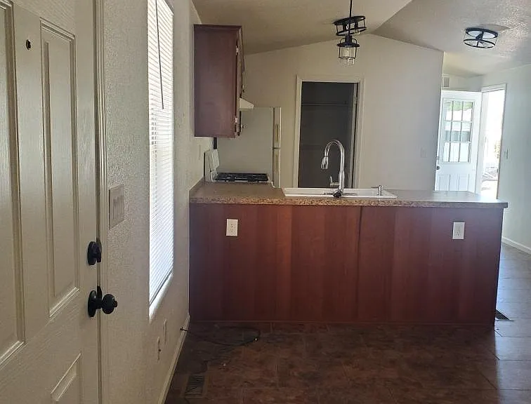 Looking into kitchen from front hall