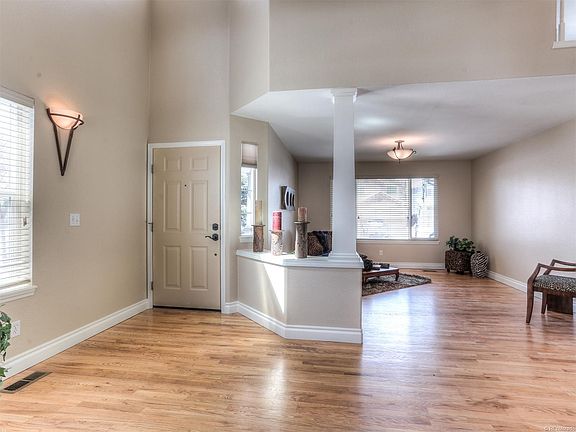 Vaulted Entry and Formal Living Room View