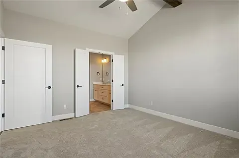 Double doors in the primary open up to the primary bathroom