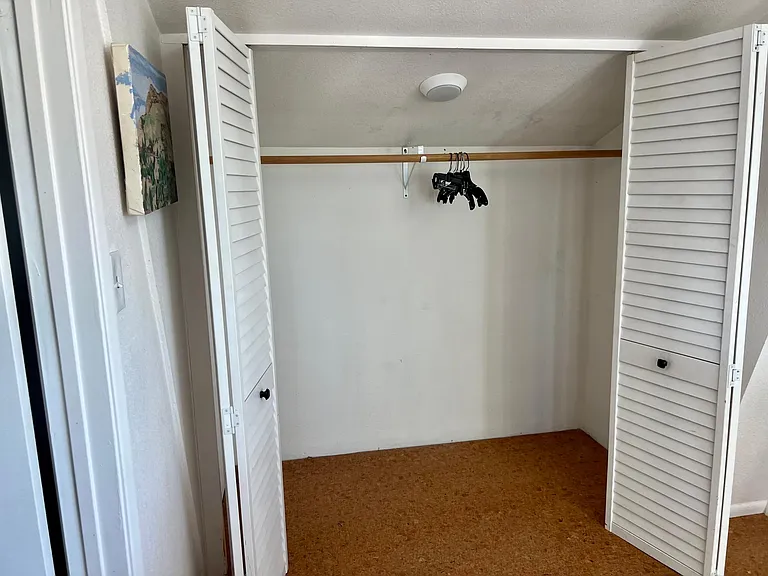 Upstairs unit - closet at the top of stairs.