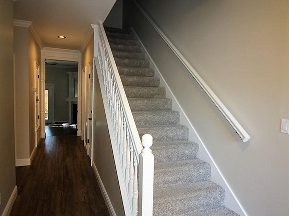 Foyer, entry hall, and second floor stairs