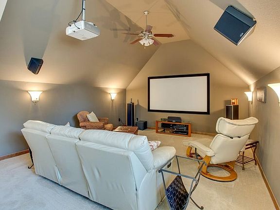 Entertain in the Media Room, complete with a projector & screen.