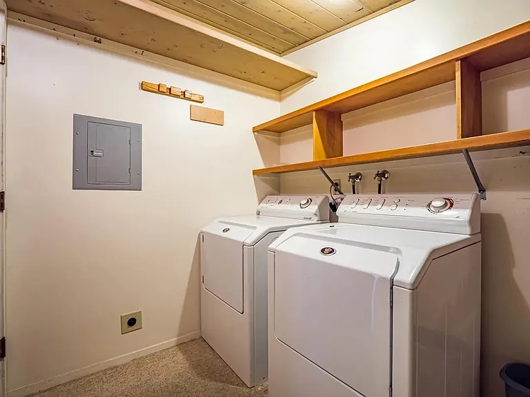 Laundry room in adjacent structure