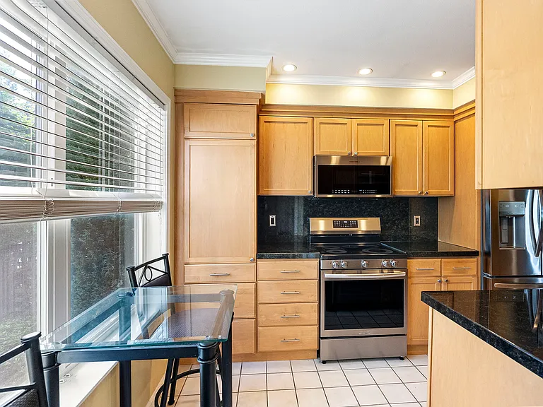 Sunny kitchen with 2024 appliances