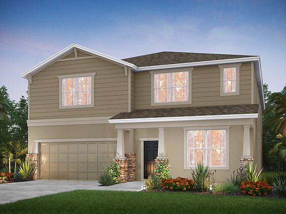 The Valencia, a two-story family home with a 2 car garage, shown in Home Exterior 6