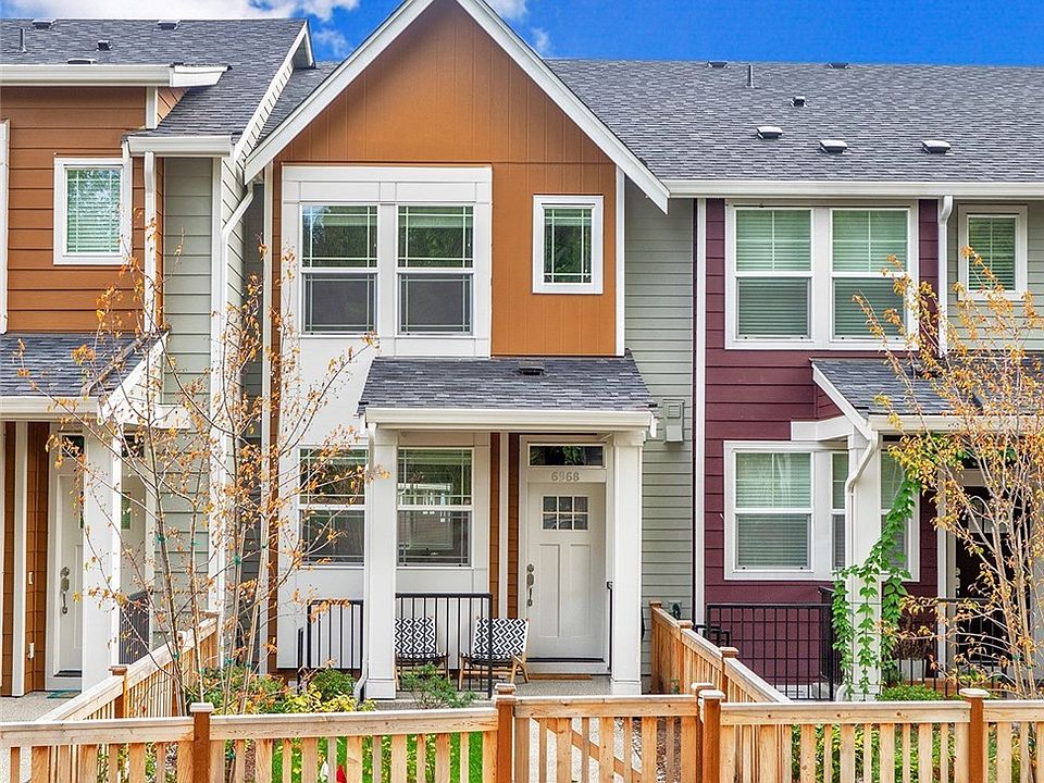 Front of the home with porch and patio. Facing the Hundley Park.