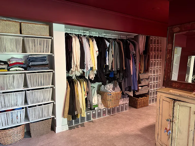 primary bedroom closet/laundry area