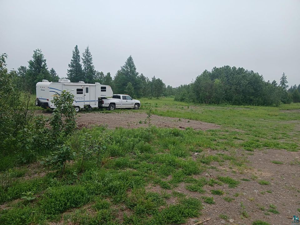 2nd image of 7473 Comstock Lake Rd Lot #2 behind 7473