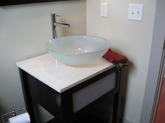 Vessel Sink in 1/2 bath with hand stenciled walls.  