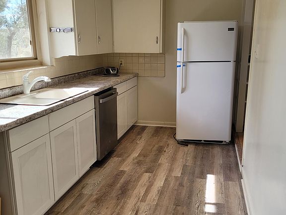 New kitchen cabinets, counters, floors, etc.