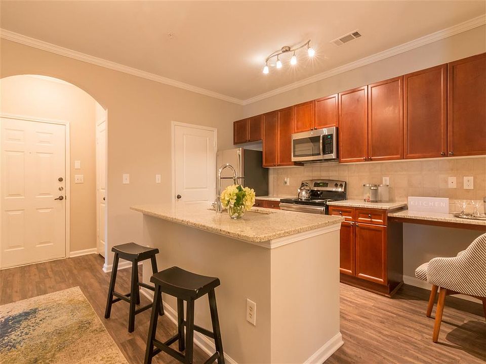 Renovated Kitchens with Tile Backsplash and Granite Counters
