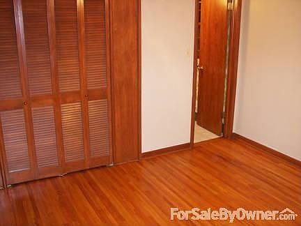Master Bedroom w/wood floor w/ half bath