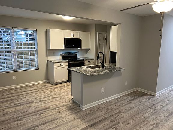 All new eat-in kitchen from family room. Fenced backyard accessed from kitchen.