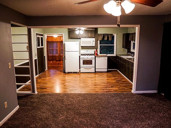 Living room looking into kitchen