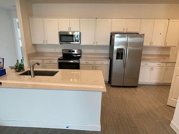 4th image of 7569 NW Deysbrook Ln