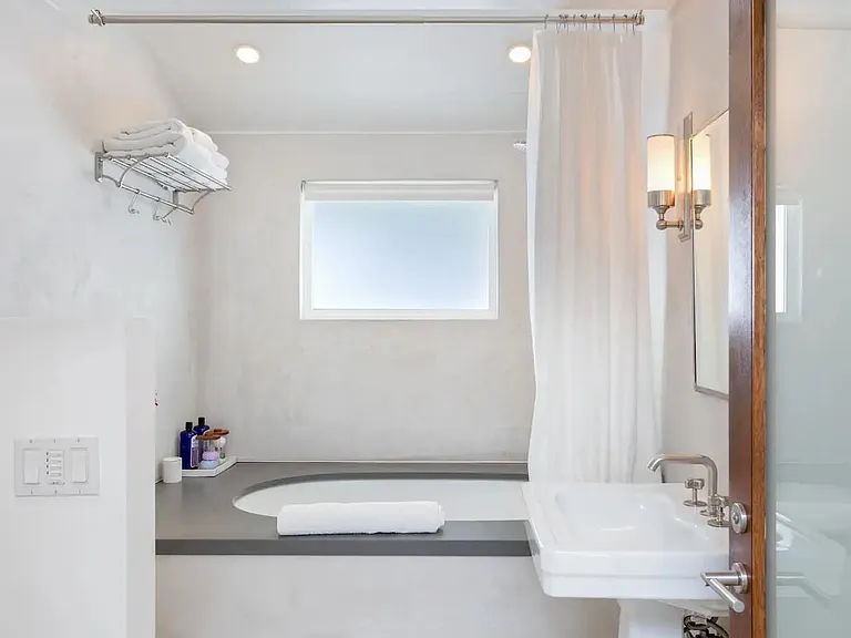 Elegant bathroom with fresh towels and all the essentials.