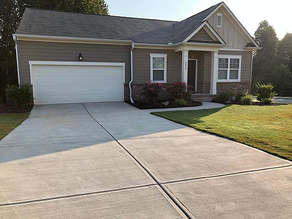 Front view with long driveway