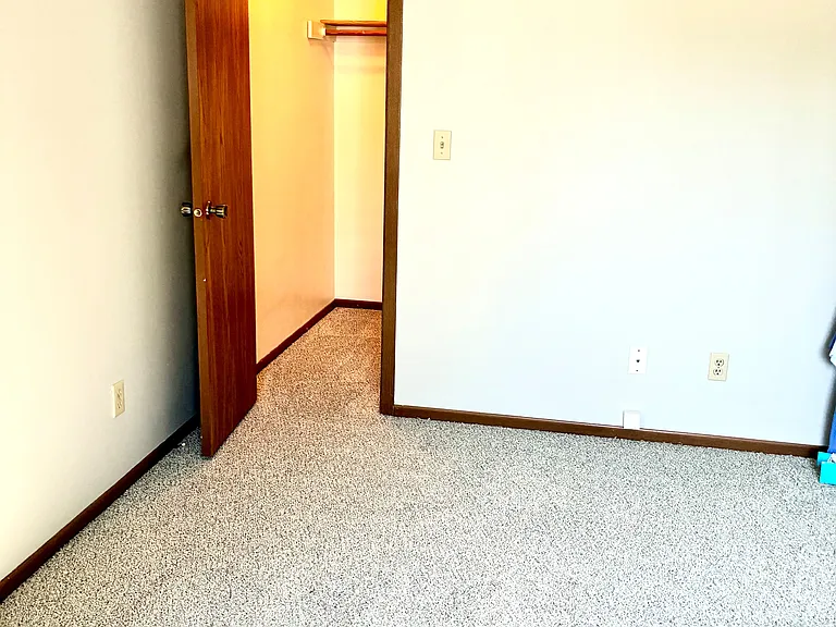 Walk in closet in primary bedroom